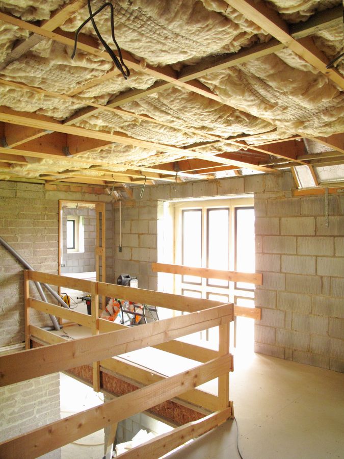 Isolation complète de plafond avec laine soufflée dans une construction résidentielle  à Berthierville